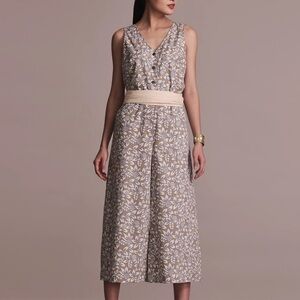 Cream and Gray Wide-Leg Jumpsuit with Deep V-Neckline